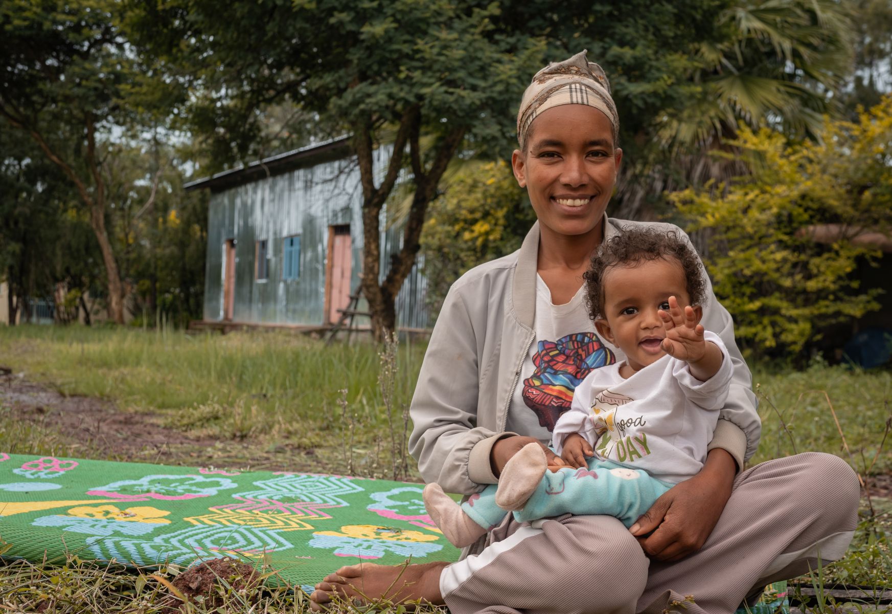 Smiling Mom with Baby